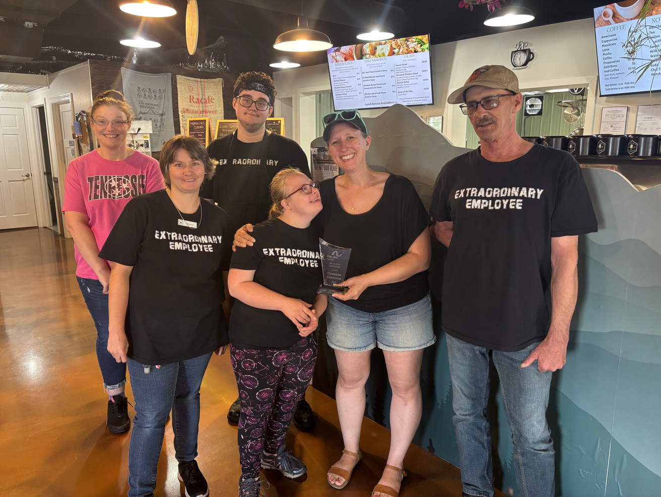 Common Grounds team inside the downtown coffee shop
