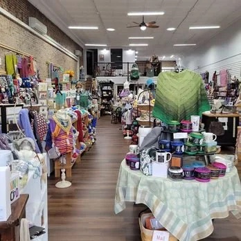 Colorful yarn and creative supplies inside The Yarn Patch